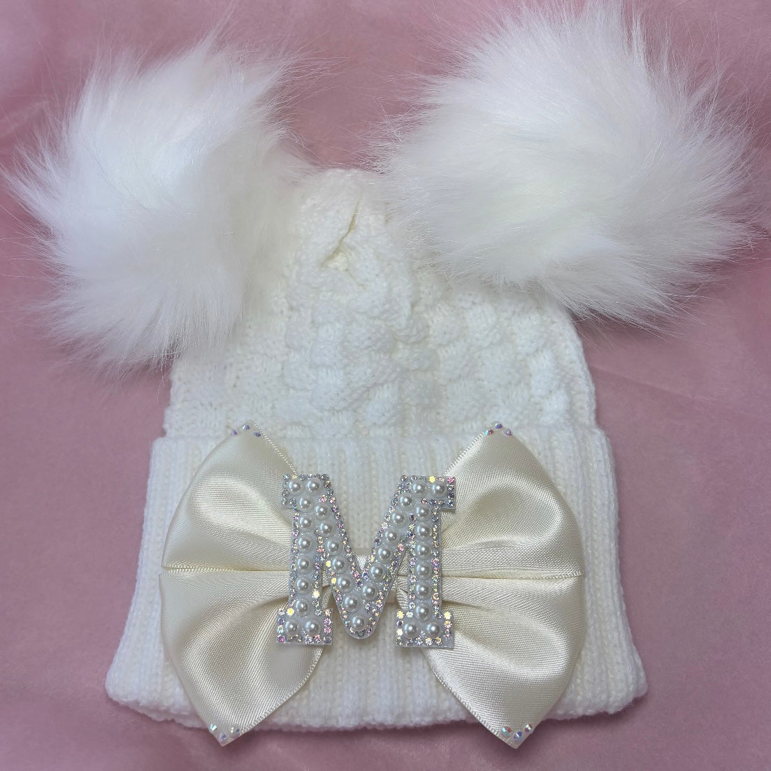 Double pom pom bow hat
